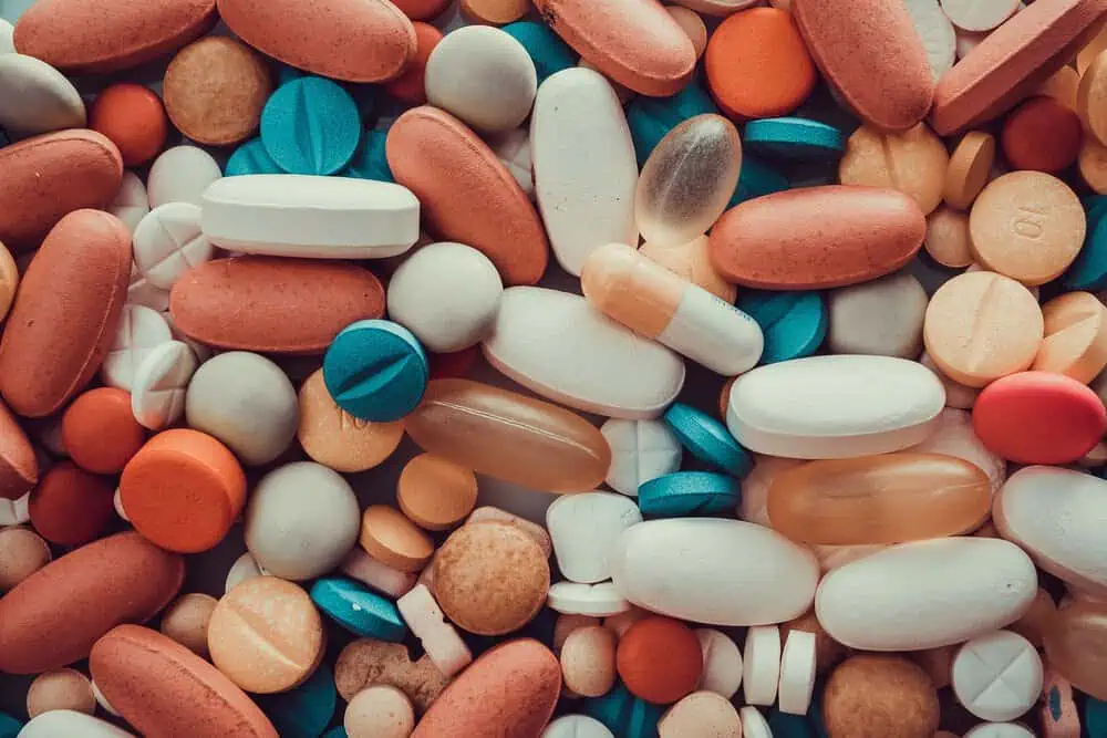close up of a variety of pills - dangerous drugs lawyer concept