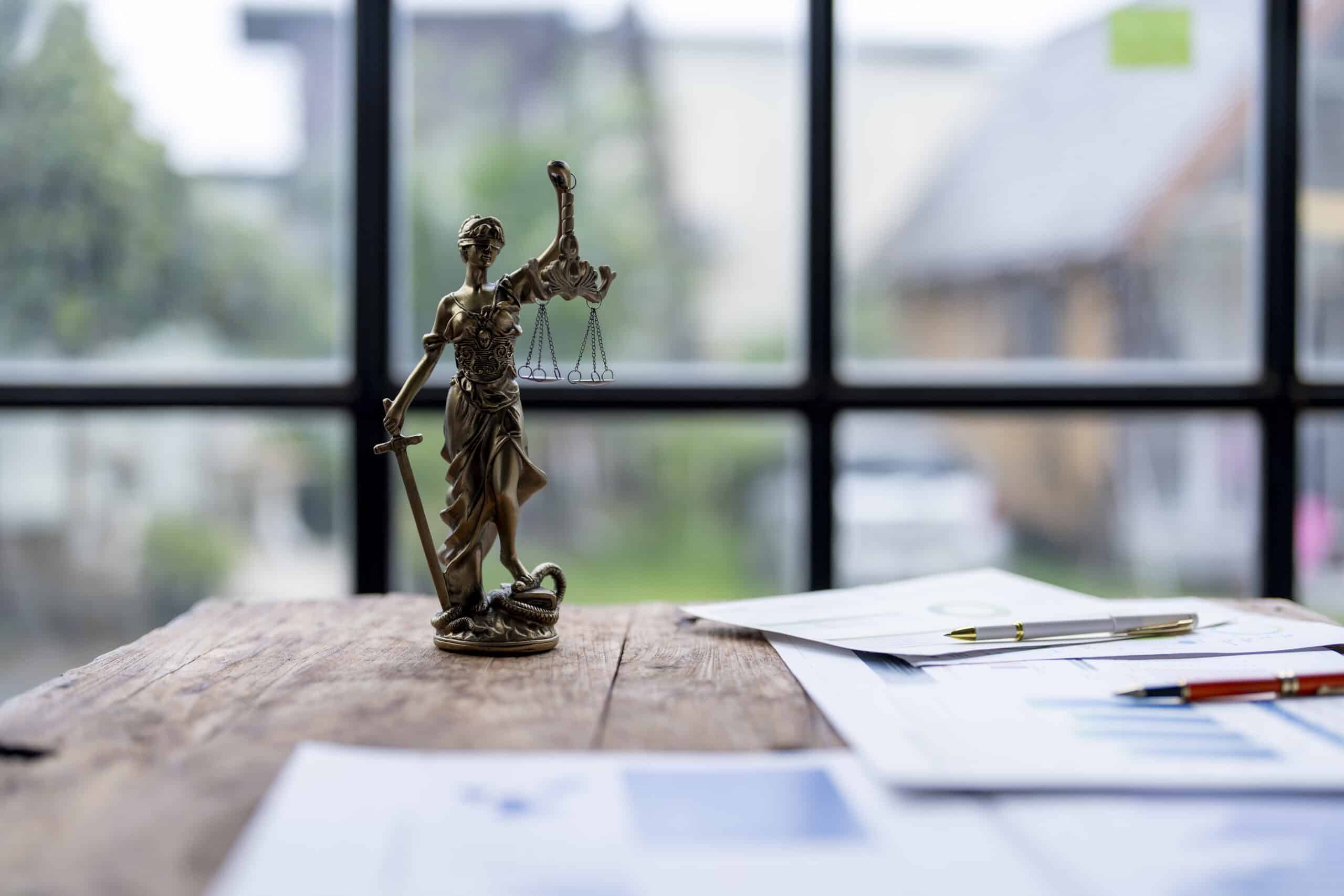 Lady Justice statue symbolizing personal injury lawsuit and car accident compensation